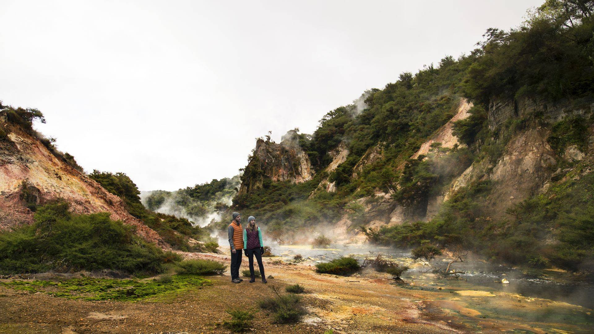 Couple in geothermal park at Waimangu Volcanic Valley